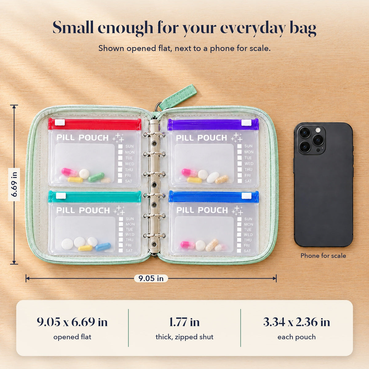 Case size: 9.05 x 6.69 in opened flat, 1.77 in thick, next to a phone